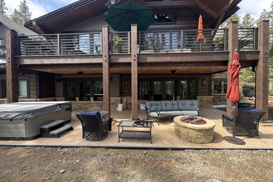 Mountain home underdeck patio with hot tub and fire pit in Castle Rock, CO