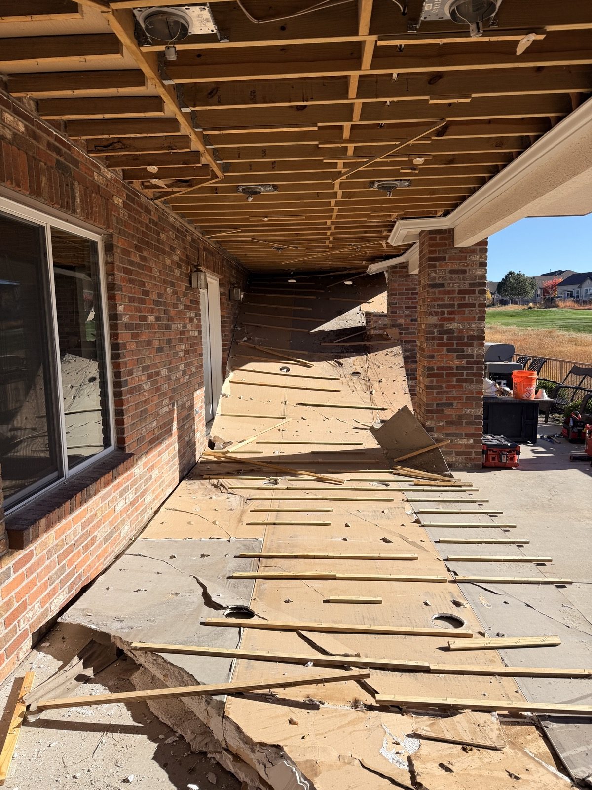 Before: raw underside of deck