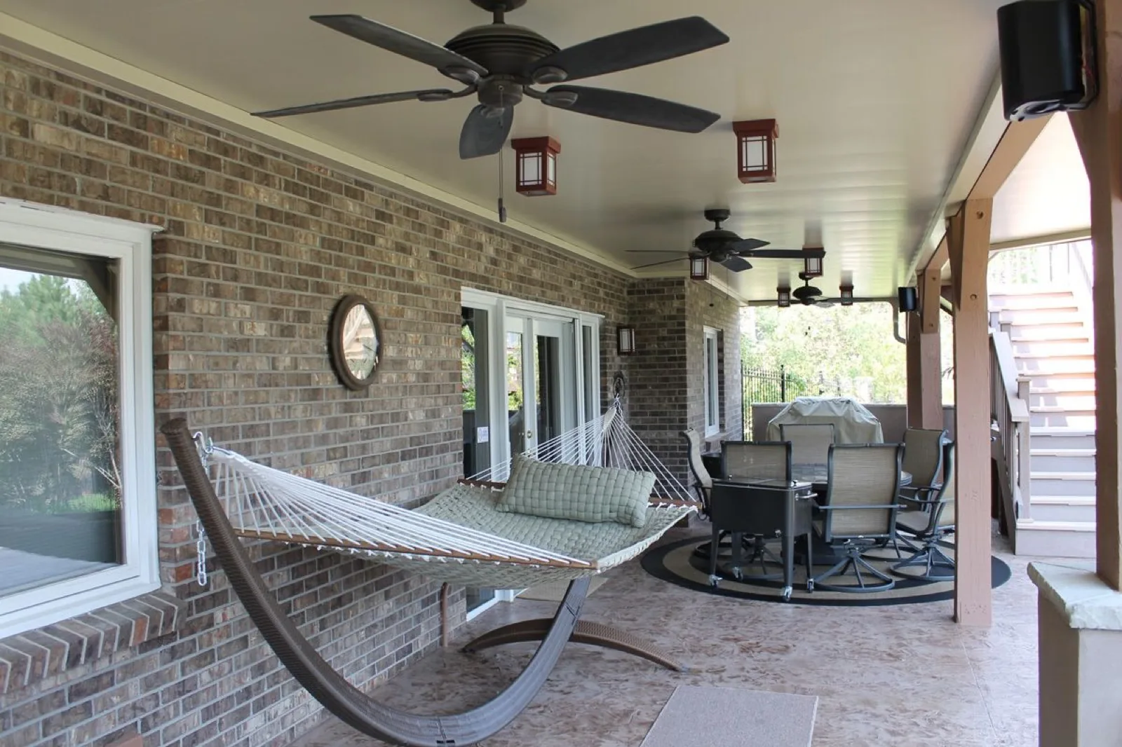 Premium accessories: integrated lighting and fans on a finished Underdeck ceiling