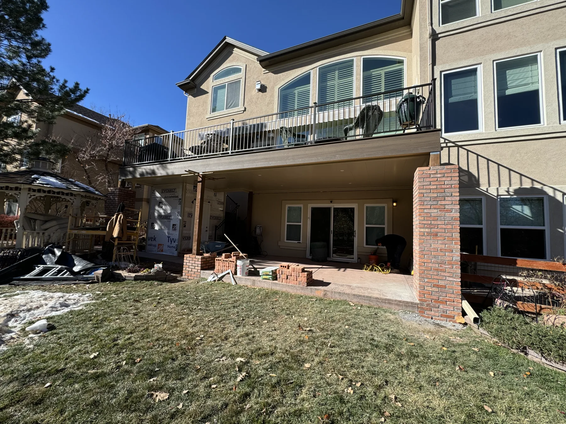Two-story new construction with finished Undercover Systems Underdeck