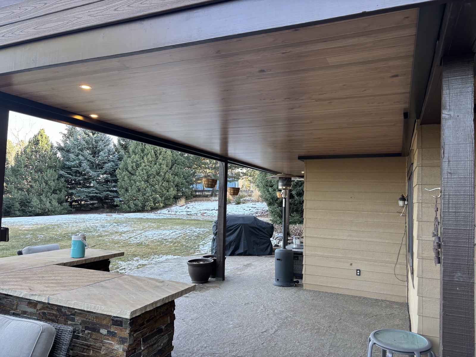 After: completed outdoor living space with dry Underdeck
